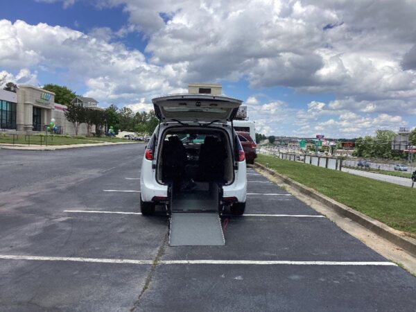 White Chrysler Pacifica with Driverge Rear Entry Manual Fold Out conversion