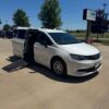 White Chrysler Voyager with Driverge Side Entry Automatic Fold Out conversion