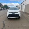 White Toyota Sienna with BraunAbility Side Entry Automatic Fold Out conversion