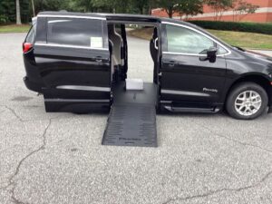Black Chrysler Pacifica with Driverge Side Entry Automatic Fold Out conversion