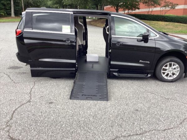 Black Chrysler Pacifica with Driverge Side Entry Automatic Fold Out conversion