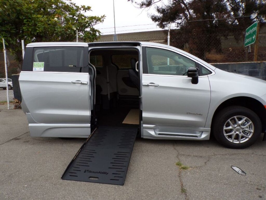 Silver Chrysler Pacifica with BraunAbility Side Entry Automatic Fold Out conversion