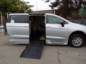 Silver Chrysler Pacifica with BraunAbility Side Entry Automatic Fold Out conversion
