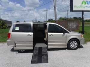 Gold Dodge Grand Caravan with Other Side Entry Manual Fold Out conversion