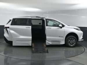 White Toyota Sienna with BraunAbility Side Entry Automatic Fold Out conversion