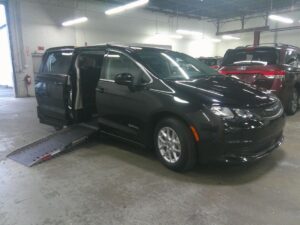Black Chrysler Voyager with Driverge Side Entry Automatic Fold Out conversion