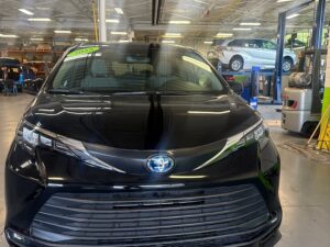 Black Toyota Sienna with BraunAbility Side Entry Automatic In Floor conversion