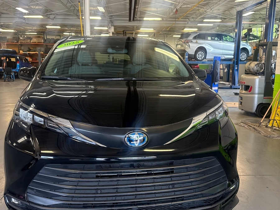 Black Toyota Sienna with BraunAbility Side Entry Automatic In Floor conversion