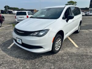 White Chrysler Voyager with BraunAbility Rear Entry Manual Fold Out conversion