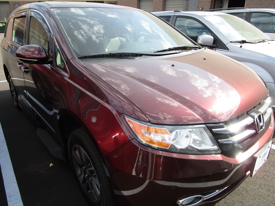 Red Honda Odyssey with Vantage Mobility Side Entry Automatic In Floor conversion