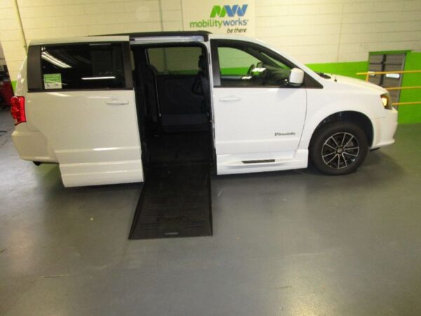 White Dodge Grand Caravan with BraunAbility Side Entry Automatic Fold Out conversion