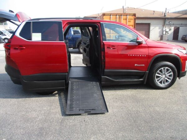 Red Chevrolet Traverse with BraunAbility Side Entry Automatic In Floor conversion