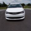 White Chrysler Voyager with Driverge Side Entry Automatic Fold Out conversion