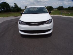 White Chrysler Voyager with Driverge Side Entry Automatic Fold Out conversion