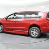 Red Chrysler Pacifica with BraunAbility Side Entry Automatic In Floor conversion