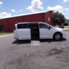 White Chrysler Voyager with Driverge Side Entry Automatic Fold Out conversion