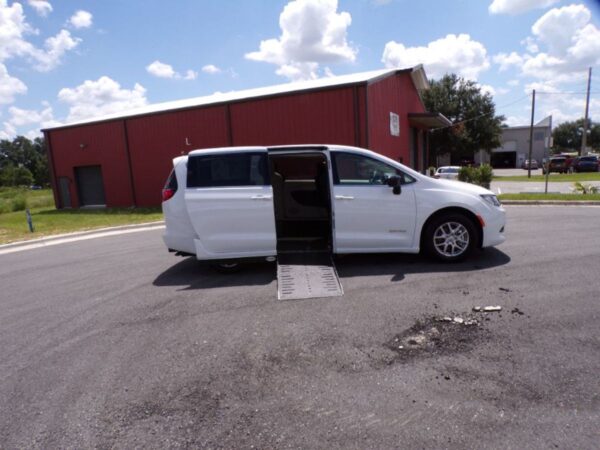 White Chrysler Voyager with Driverge Side Entry Automatic Fold Out conversion