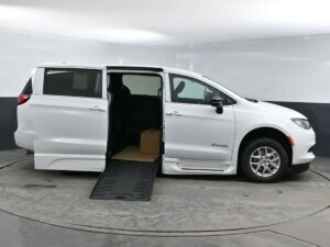 White Chrysler Voyager with BraunAbility Side Entry Automatic Fold Out conversion