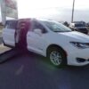 White Chrysler Pacifica with BraunAbility Side Entry Automatic Fold Out conversion