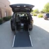 Black Toyota Sienna with Driverge Rear Entry Manual Fold Out conversion