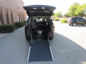 Black Toyota Sienna with Driverge Rear Entry Manual Fold Out conversion