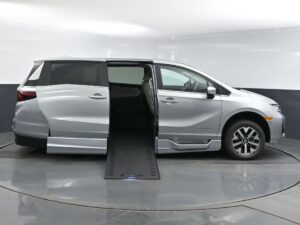 Silver Honda Odyssey with BraunAbility Side Entry Automatic In Floor conversion
