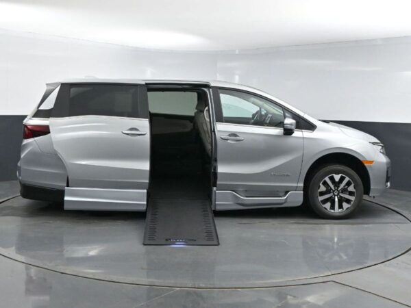 Silver Honda Odyssey with BraunAbility Side Entry Automatic In Floor conversion