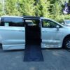 White Chrysler Pacifica with BraunAbility Side Entry Automatic Fold Out conversion