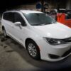 White Chrysler Pacifica with Driverge Rear Entry Manual Fold Out conversion