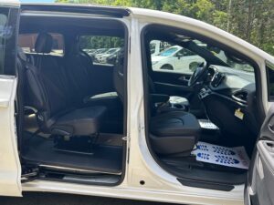 White Chrysler Voyager with BraunAbility Rear Entry Manual Fold Out conversion