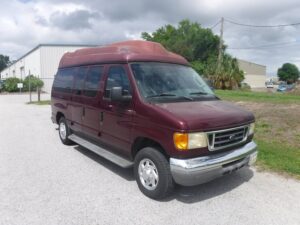 Red Ford Econoline with Other Rear Entry Automatic Fold Out conversion