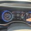 White Chrysler Pacifica with BraunAbility Side Entry Automatic Fold Out conversion