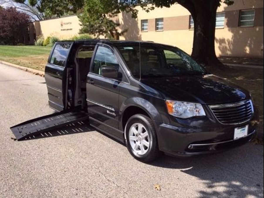 Grey Chrysler Town and Country with BraunAbility Side Entry Automatic Fold Out conversion