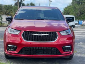 Red Chrysler Pacifica with Driverge Side Entry Automatic Fold Out conversion