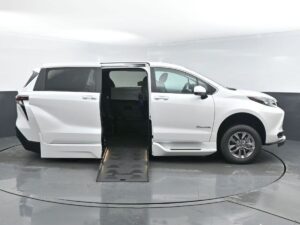 White Toyota Sienna with BraunAbility Side Entry Automatic Fold Out conversion