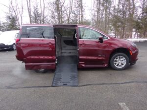 Red Chrysler Voyager with BraunAbility Side Entry Automatic Fold Out conversion