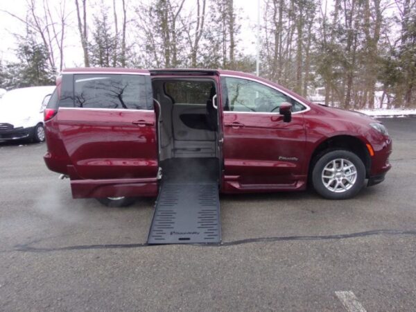 Red Chrysler Voyager with BraunAbility Side Entry Automatic Fold Out conversion