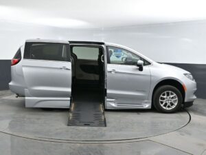 Silver Chrysler Voyager with BraunAbility Side Entry Automatic Fold Out conversion