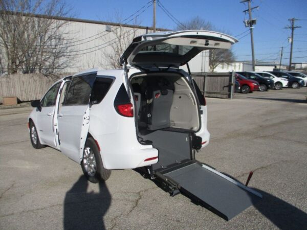 White Chrysler Voyager with Driverge Rear Entry Manual Fold Out conversion
