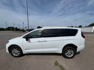 White Chrysler Voyager with BraunAbility Rear Entry Manual Fold Out conversion