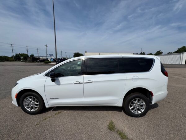 White Chrysler Voyager with BraunAbility Rear Entry Manual Fold Out conversion