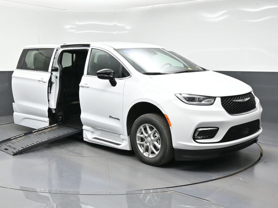 White Chrysler Pacifica with BraunAbility Side Entry Automatic Fold Out conversion