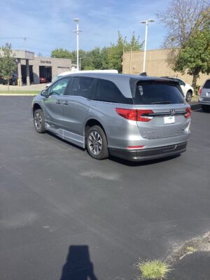 Silver Honda Odyssey with BraunAbility Side Entry Automatic In Floor conversion