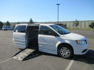 White Dodge Grand Caravan with BraunAbility Side Entry Manual Fold Out conversion