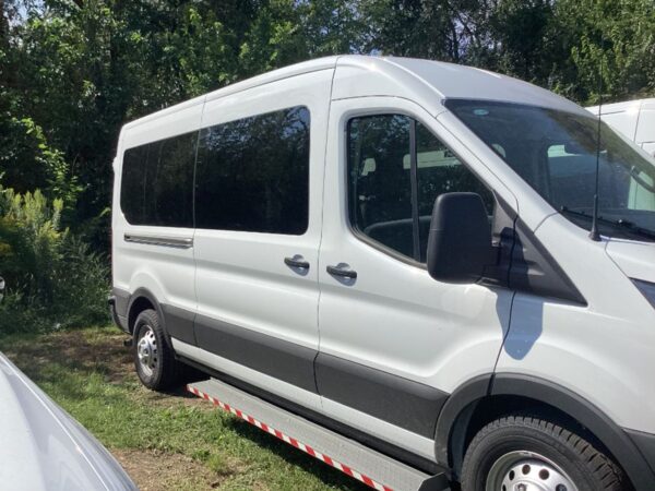 White Ford Transit with Driverge Rear Entry Automatic Fold Out conversion