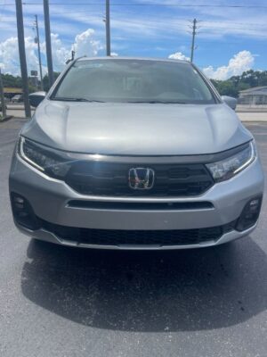 Silver Honda Odyssey with BraunAbility Side Entry Automatic In Floor conversion