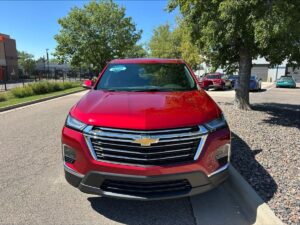 Red Chevrolet Traverse with BraunAbility Side Entry Automatic In Floor conversion