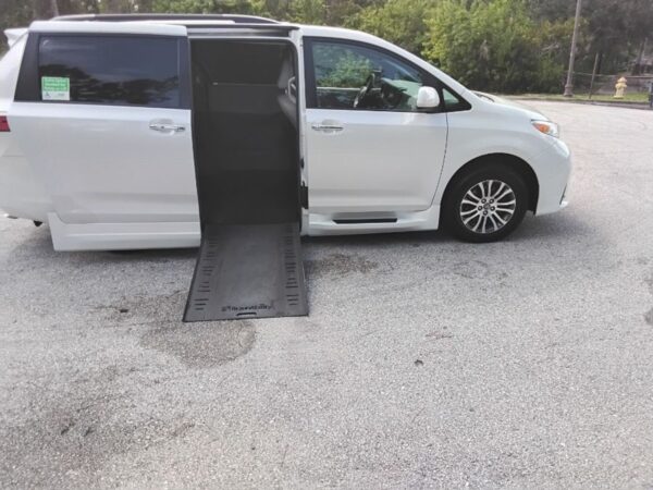 White Toyota Sienna with BraunAbility Side Entry Automatic In Floor conversion