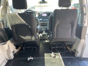 White Chrysler Voyager with BraunAbility Side Entry Automatic Fold Out conversion