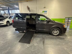 Grey Dodge Grand Caravan with Adaptive Vans Side Entry Automatic Fold Out conversion